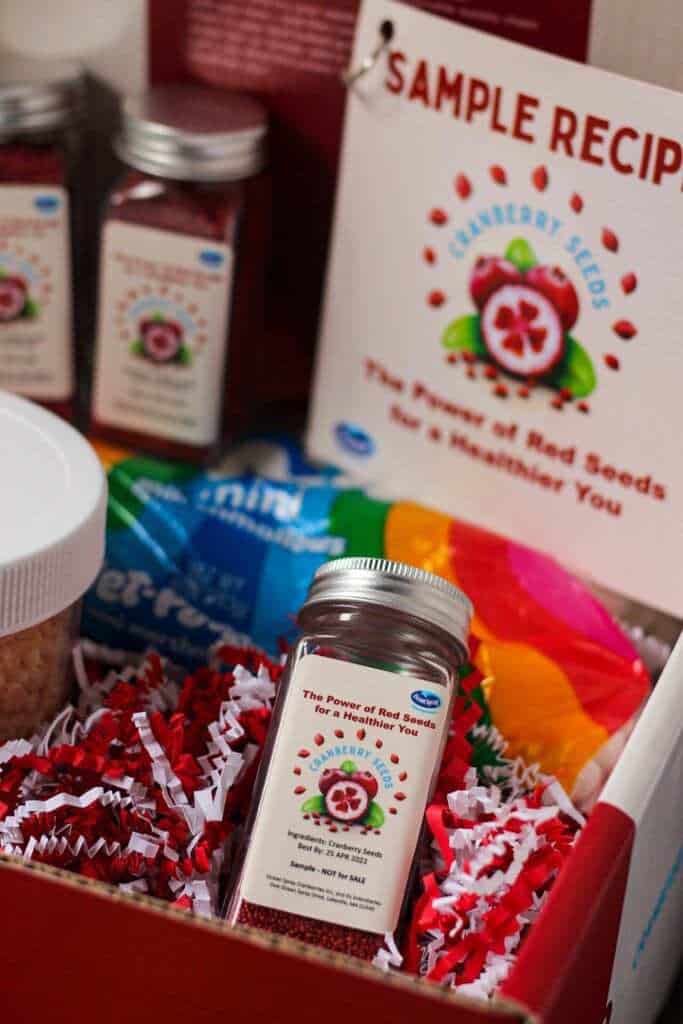 overhead shot of Ocean Spray Cranberry Seeds in box with recipe cards and package of marshmallows in the background.