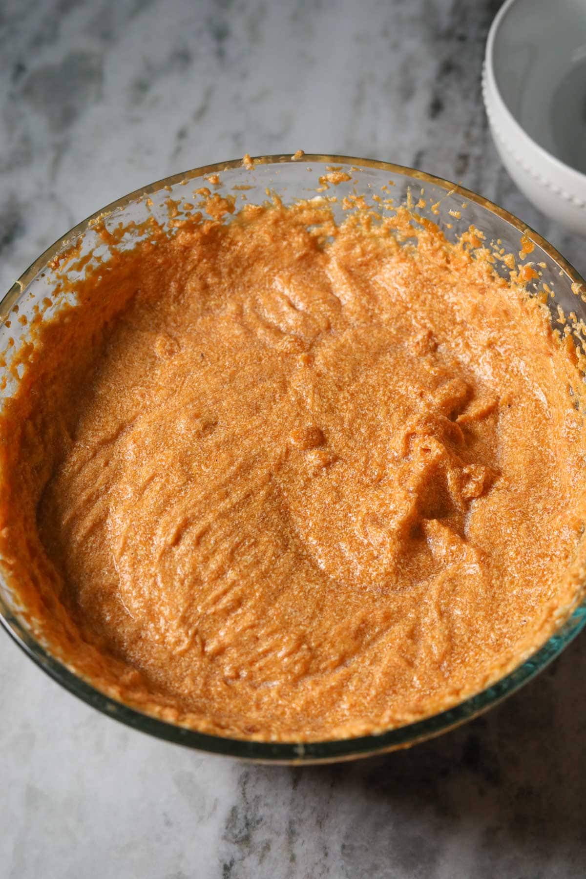 Sweet potato pie filling in a large mixing bowl.