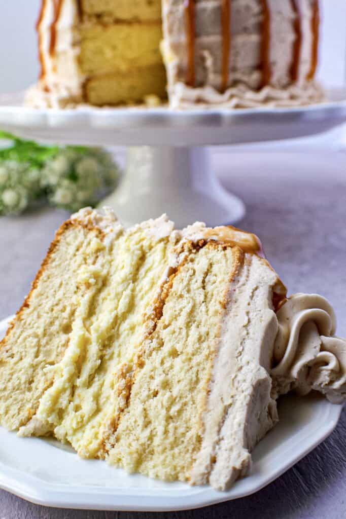 close up of caramel cheesecake layer cake