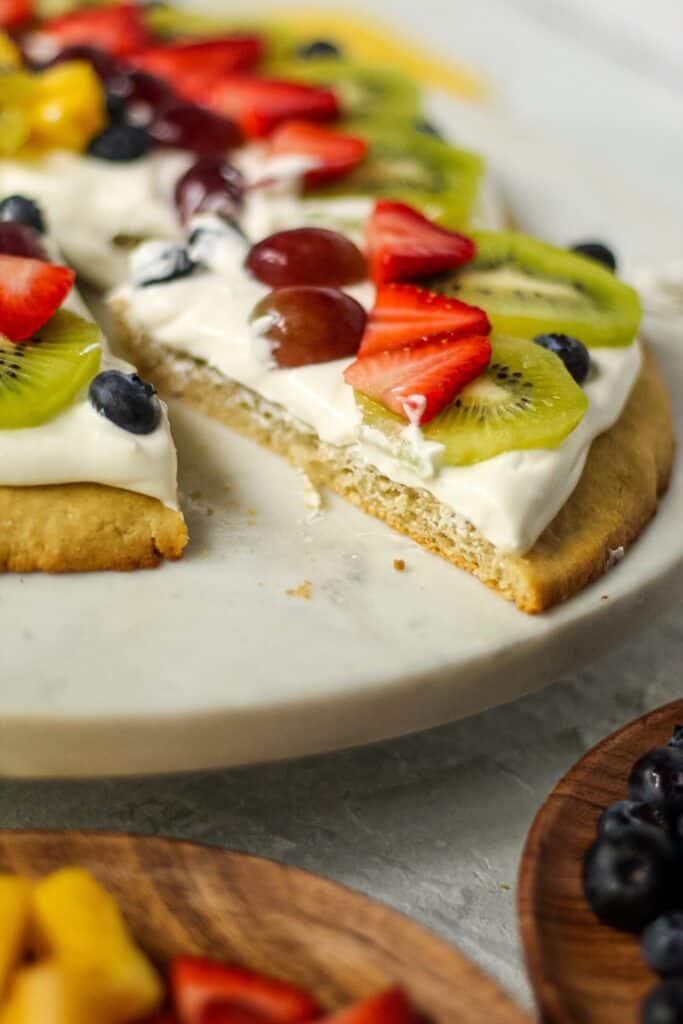 close up of sliced gluten-free fruit pizza
