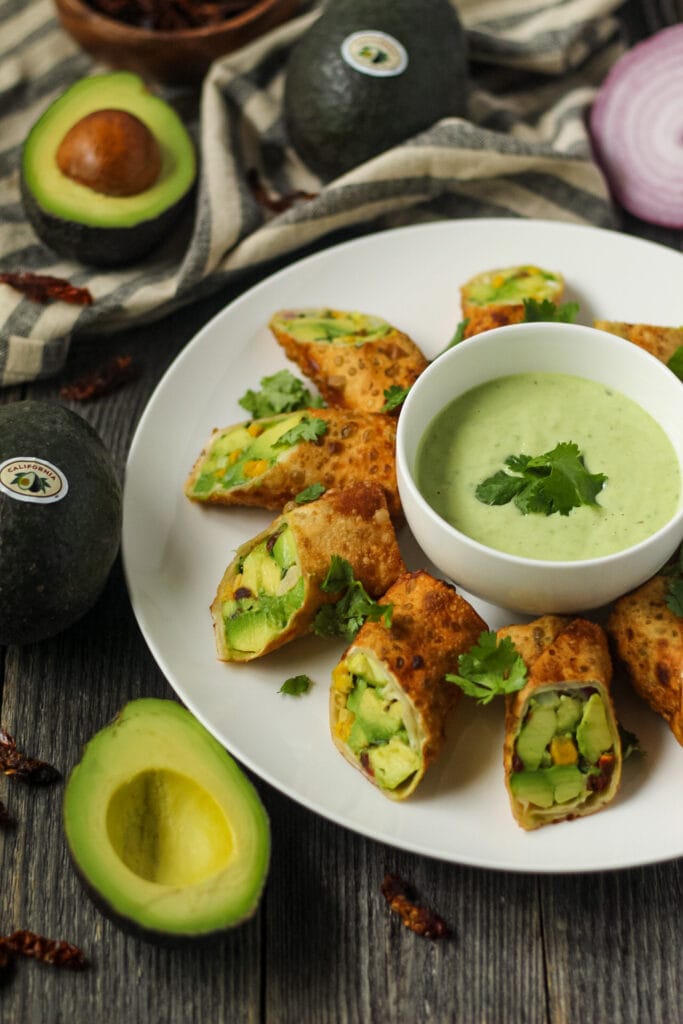 side angle shot of avocado egg rolls