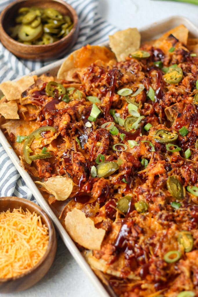 side angle shot of bbq salmon nachos
