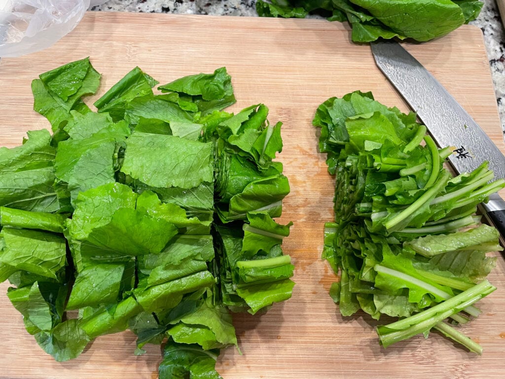 chopped turnip greens on cutting board.