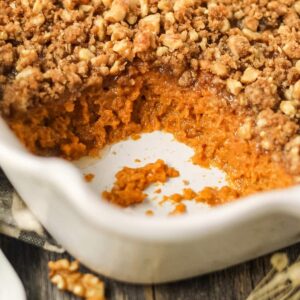 southern sweet potato casserole in a white baking dish.