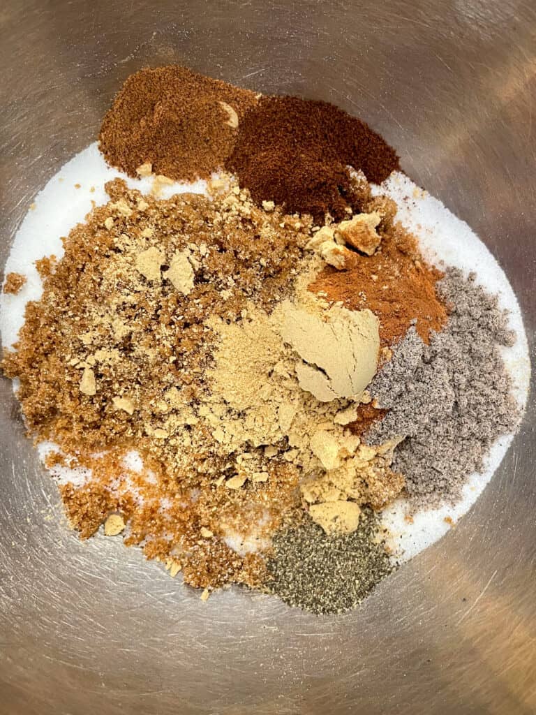 overhead shot of chai sugar ingredients in bowl