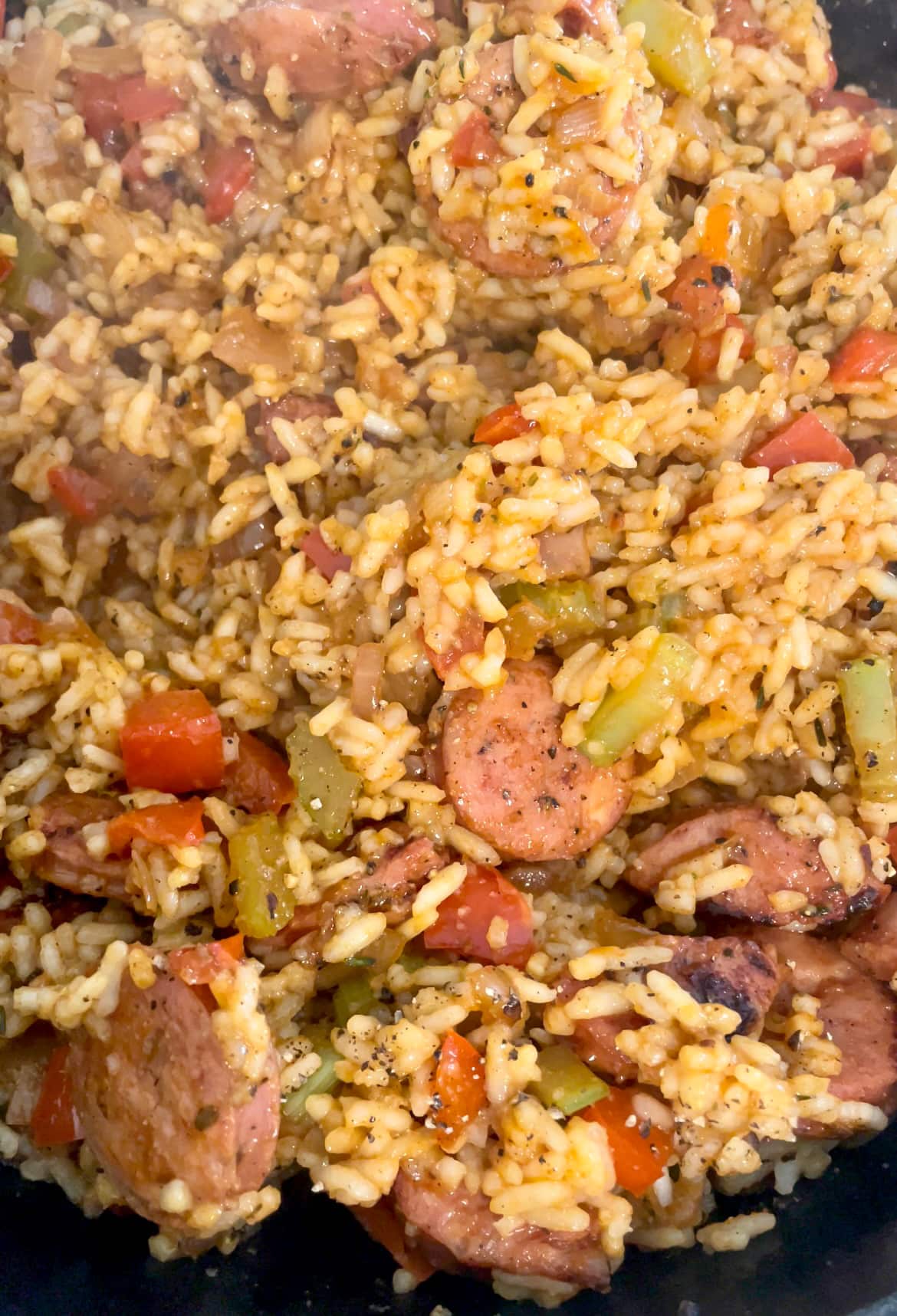 dirty rice cooking in skillet