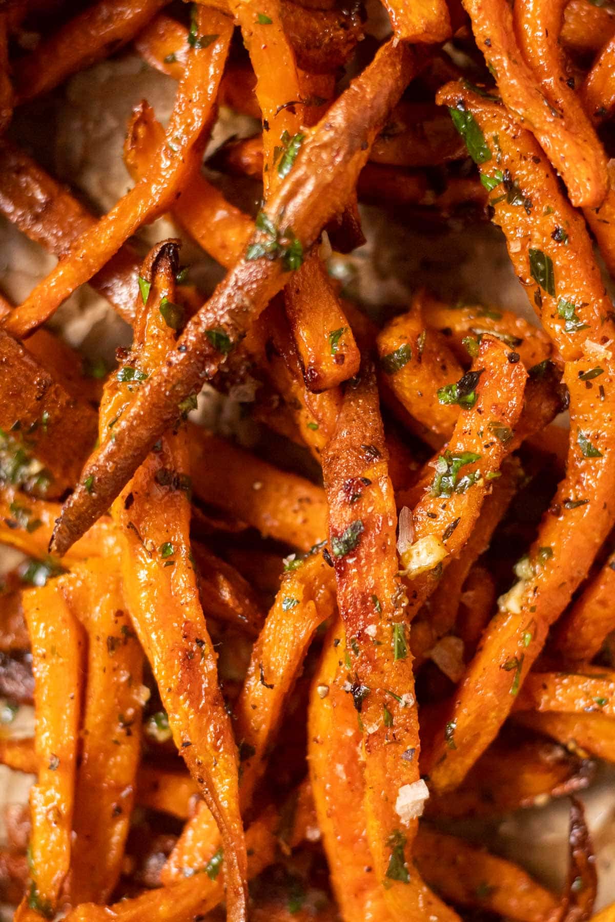 detail shot of cajun herb butter sweet potato fries