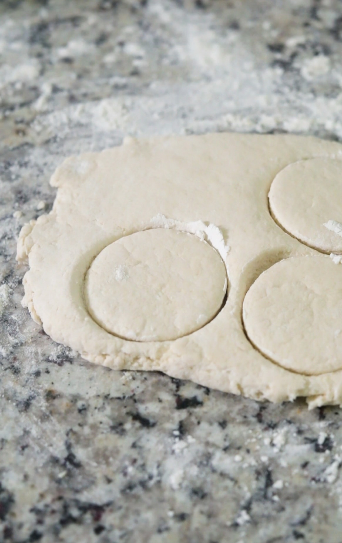 sour cream biscuits being cut out.