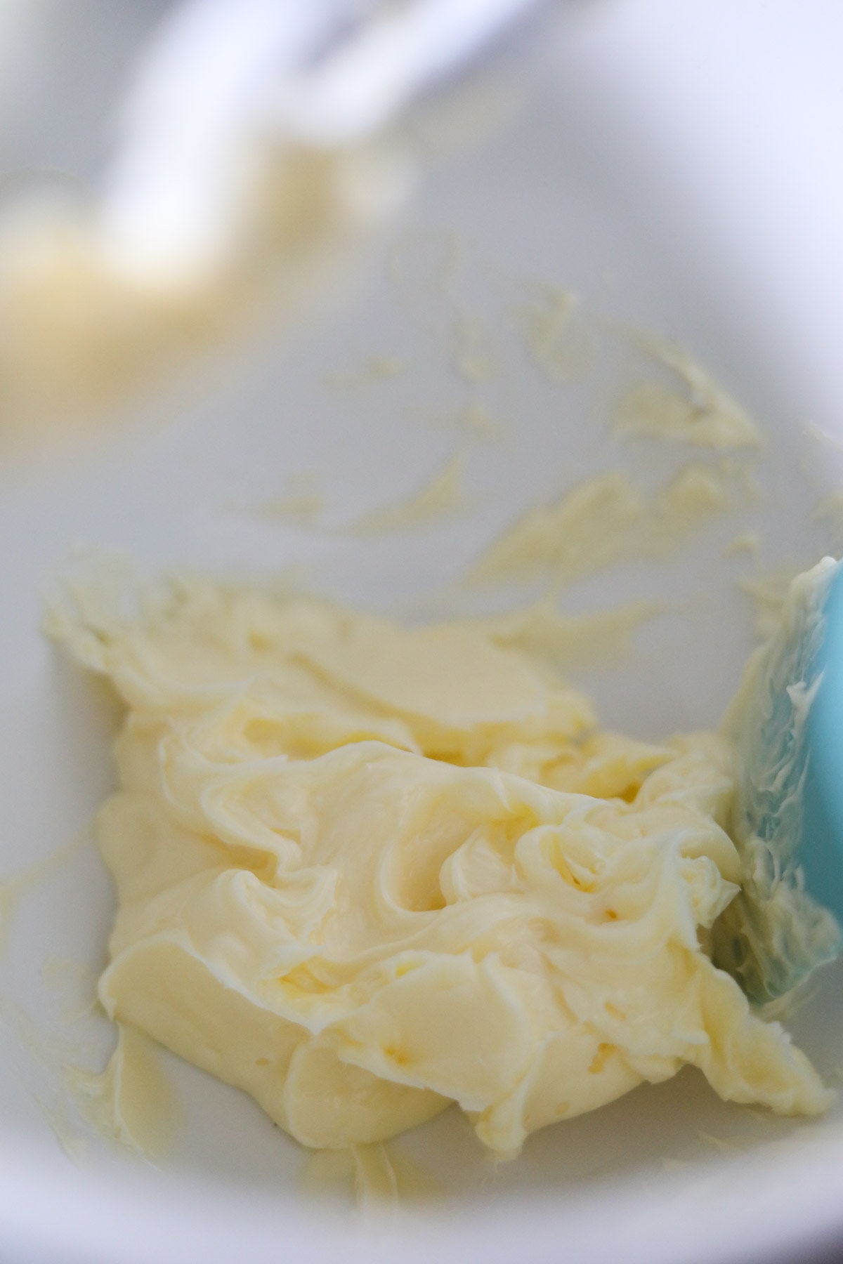 butter creamed in a mixing bowl.