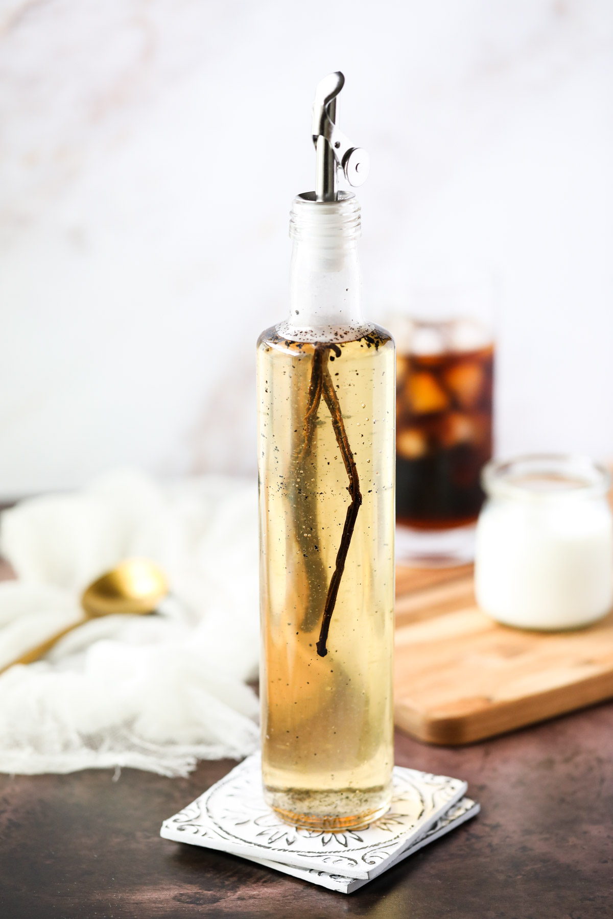 homemade vanilla syrup in a glass bottle.
