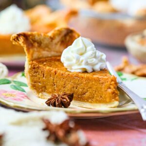A slice of southern sweet potato pie on a dessert plate.