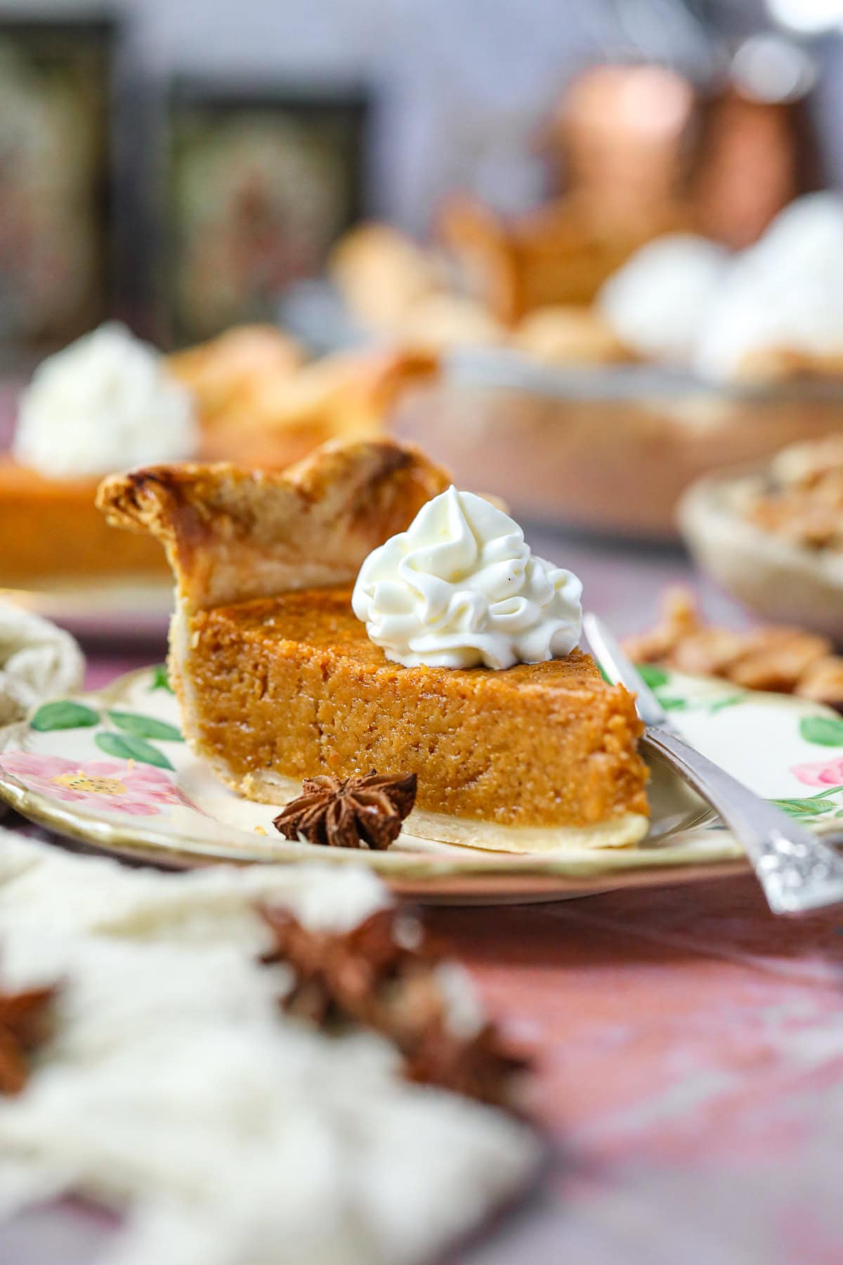 A slice of southern sweet potato pie on a dessert plate.