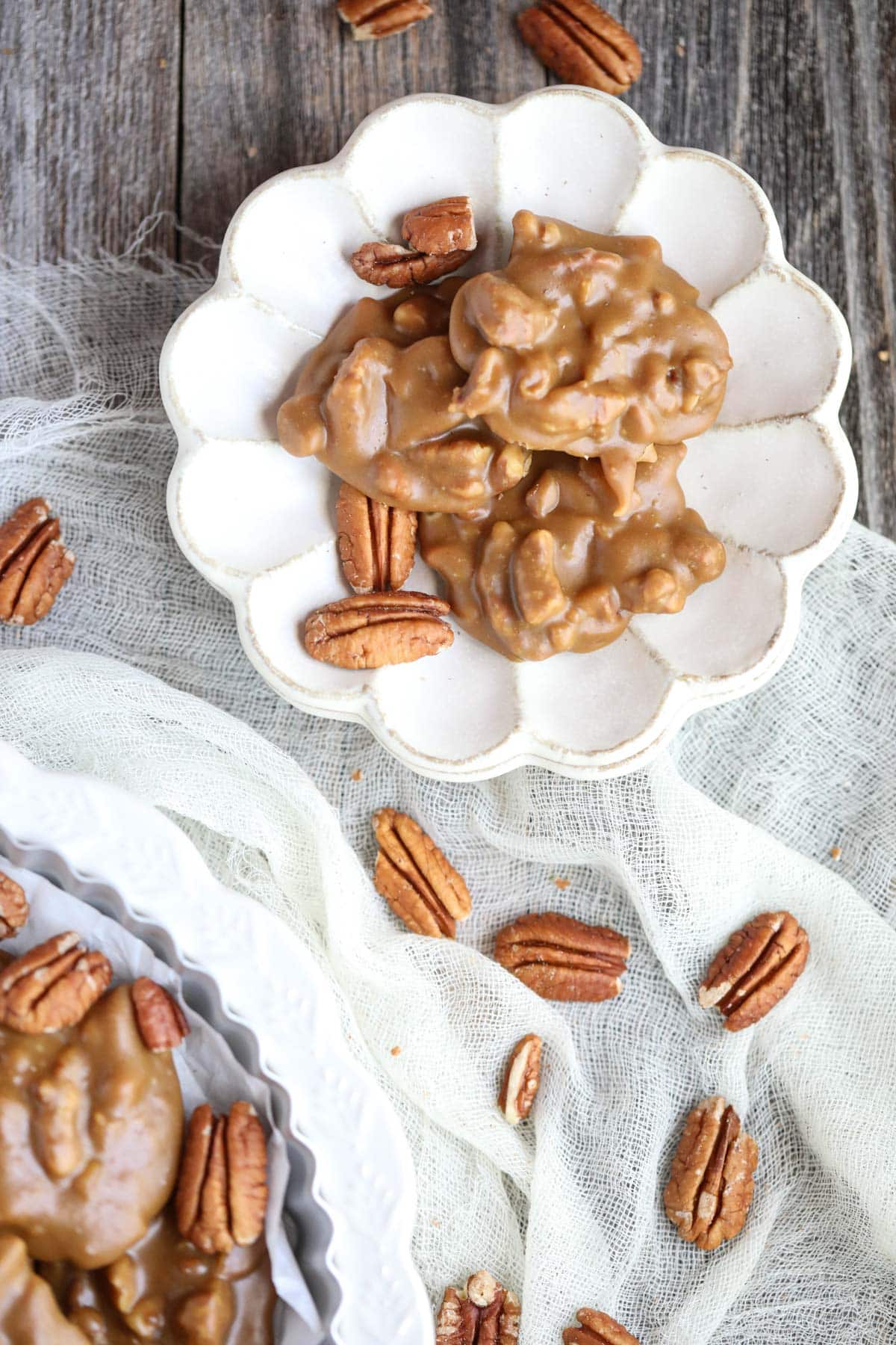 southern pecan pralines arranged on a small white plate.