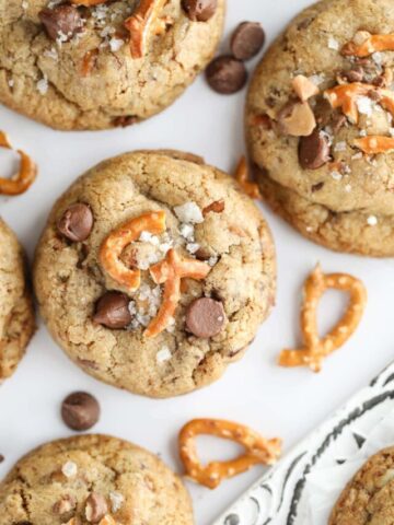kitchen sink cookies spread out on a white surface.
