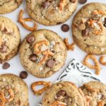 kitchen sink cookies spread out on a white surface.