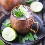 Virgin Moscow mule Mocktail in a copper mug on a silver tray.