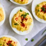 Southern deviled eggs arranged on a serving platter.