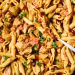 bbq chicken pasta in a cast iron skillet.