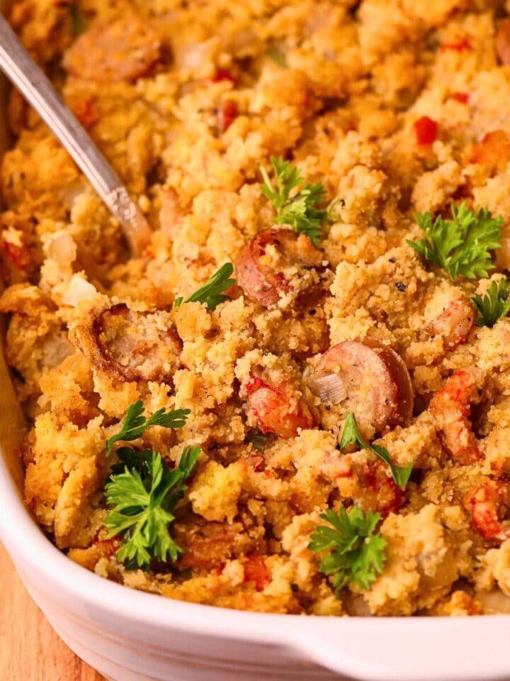 Crawfish cornbread dressing in a baking dish.