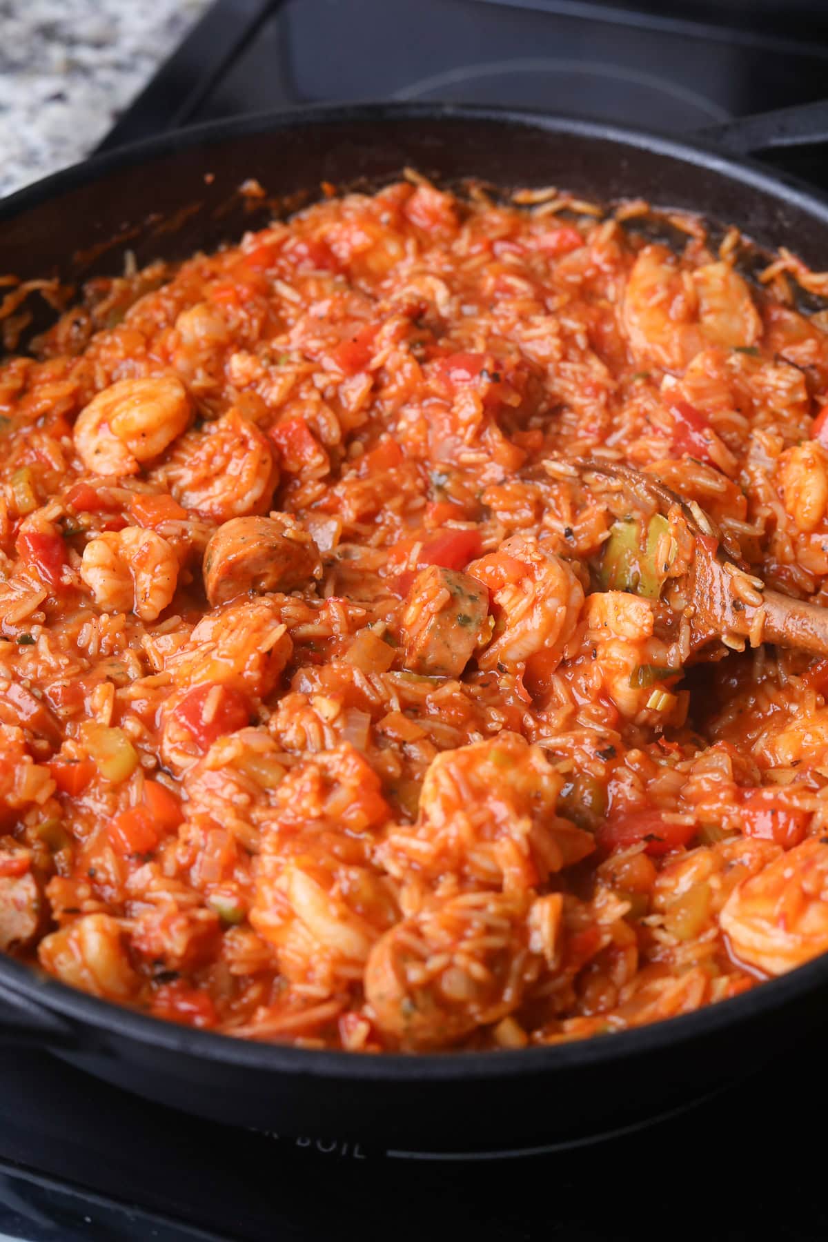 Shrimp and sausage jambalaya finished cooking on the stove top.