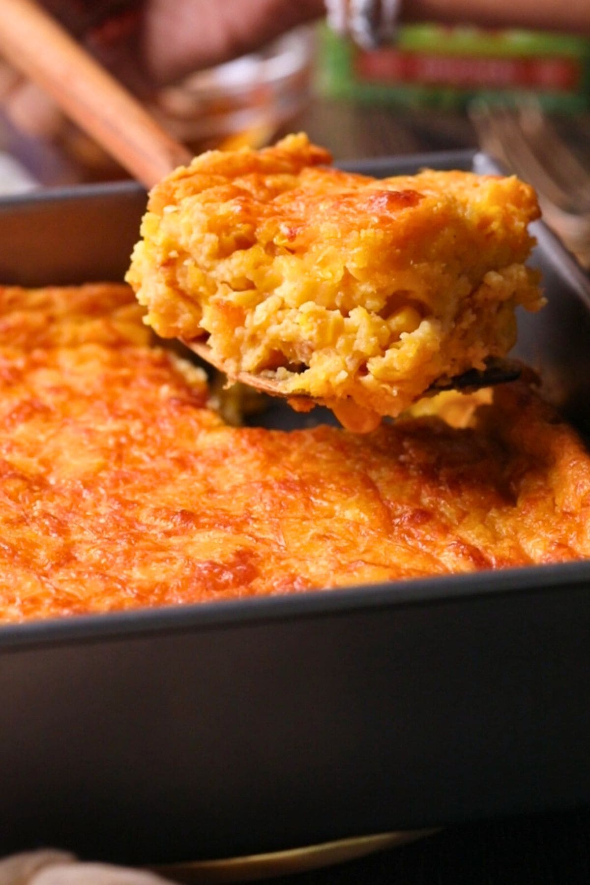Baked creamy cheesy cornbread casserole after cooling.