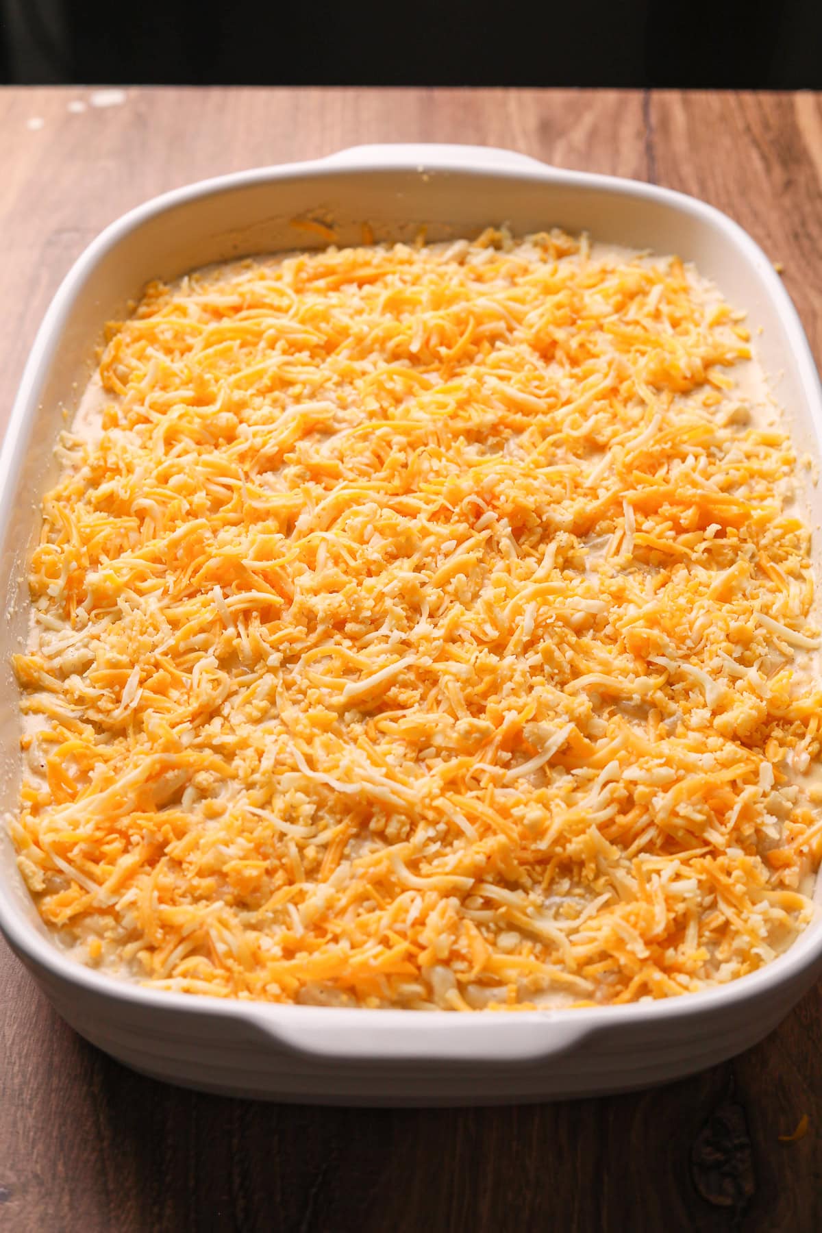 Southern baked mac & cheese in a baking dish before going into the oven.