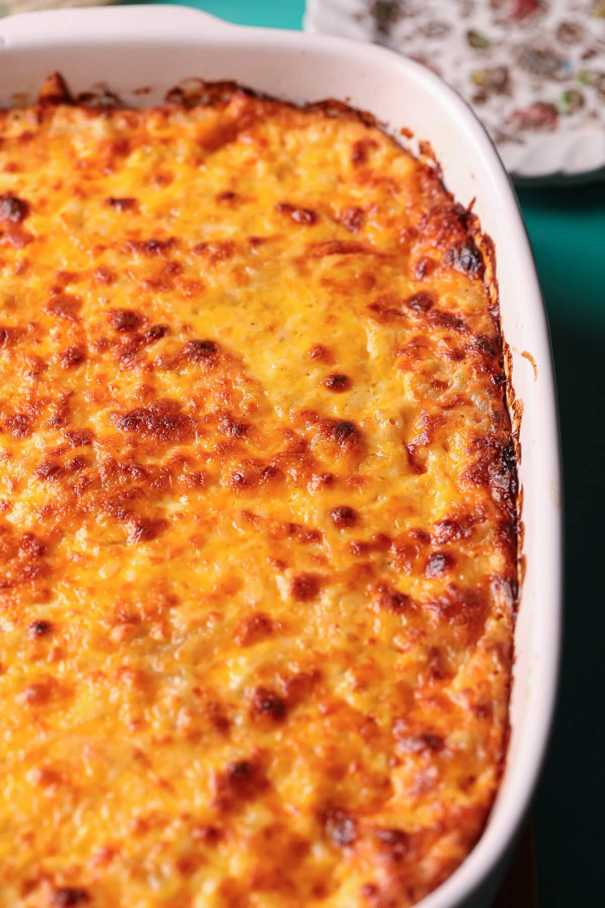 Freshly baked southern mac & cheese in a baking dish.