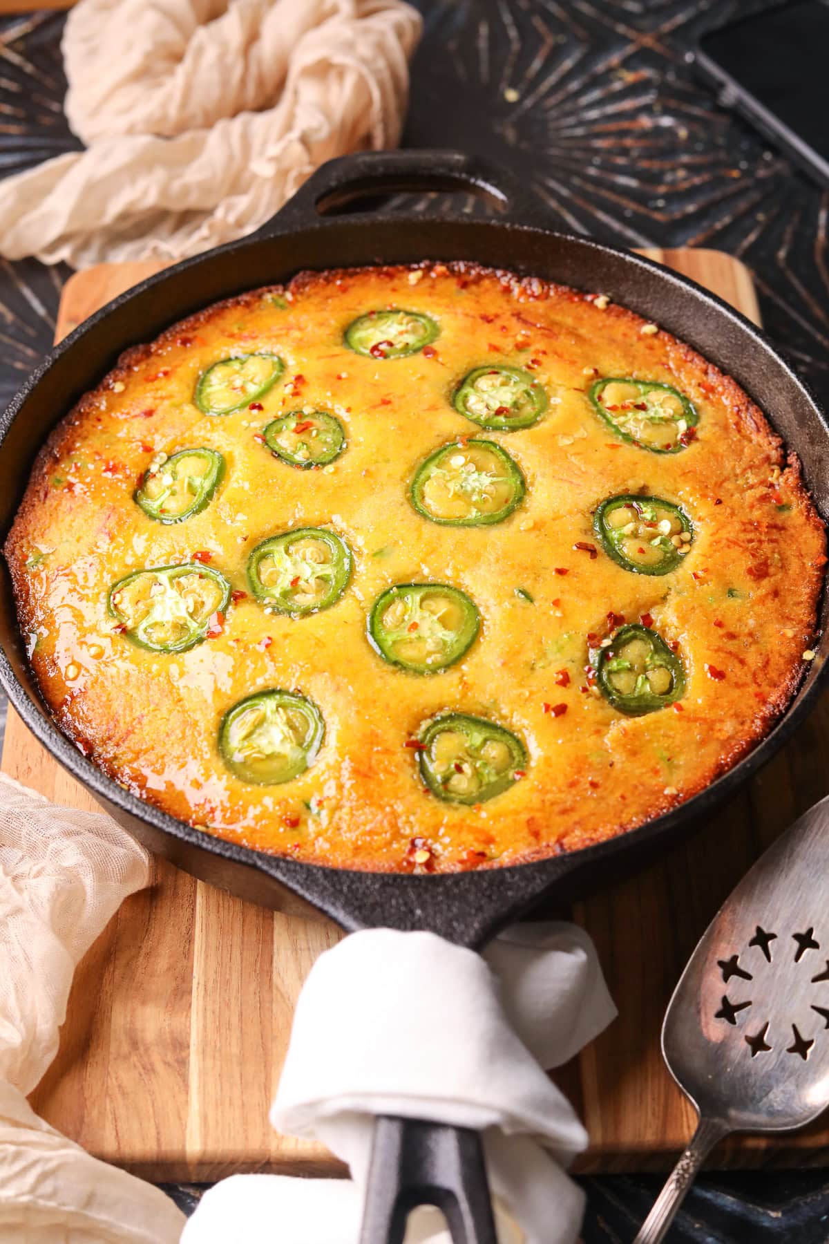 Jalapeño cheddar cornbread with spicy honey butter fresh out of the oven.