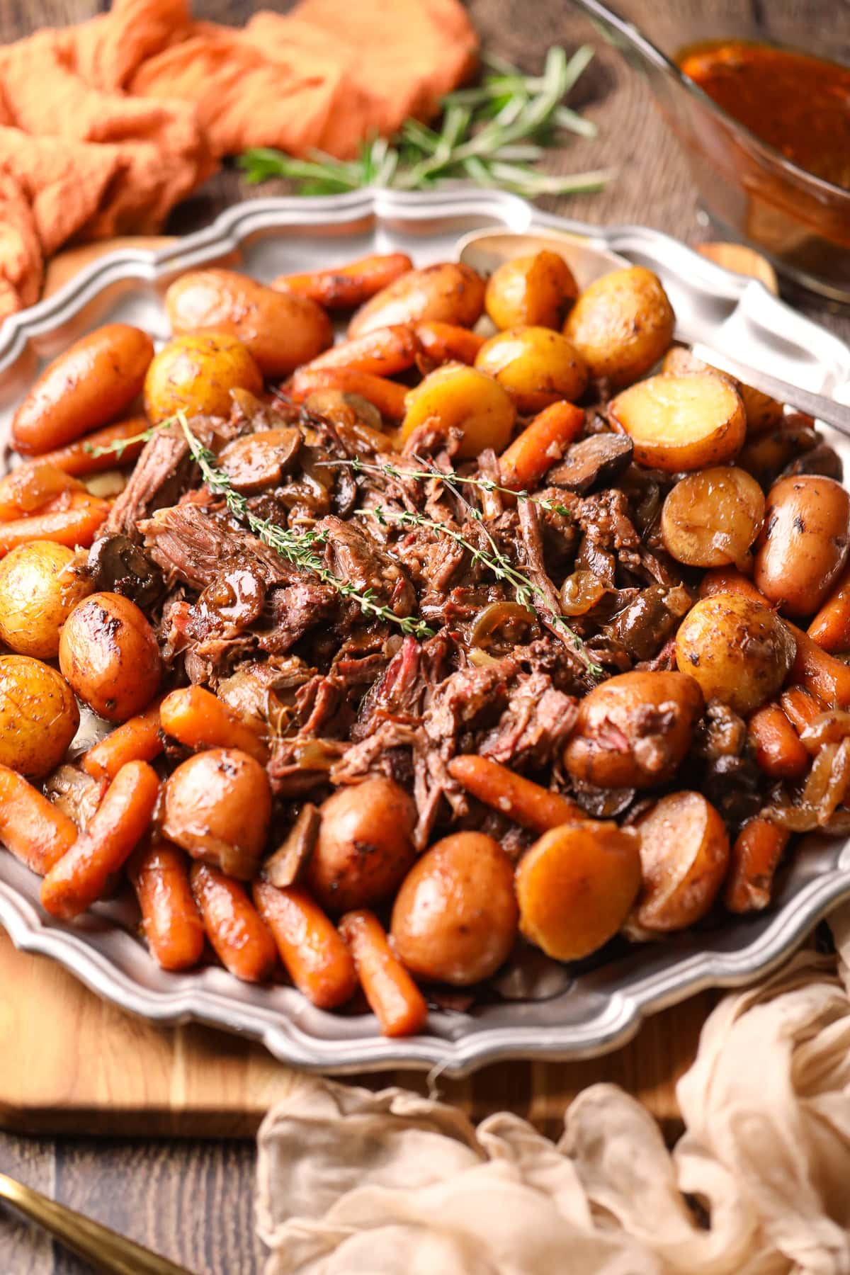 Ultimate Dutch oven pot roast with vegetables on a serving platter.