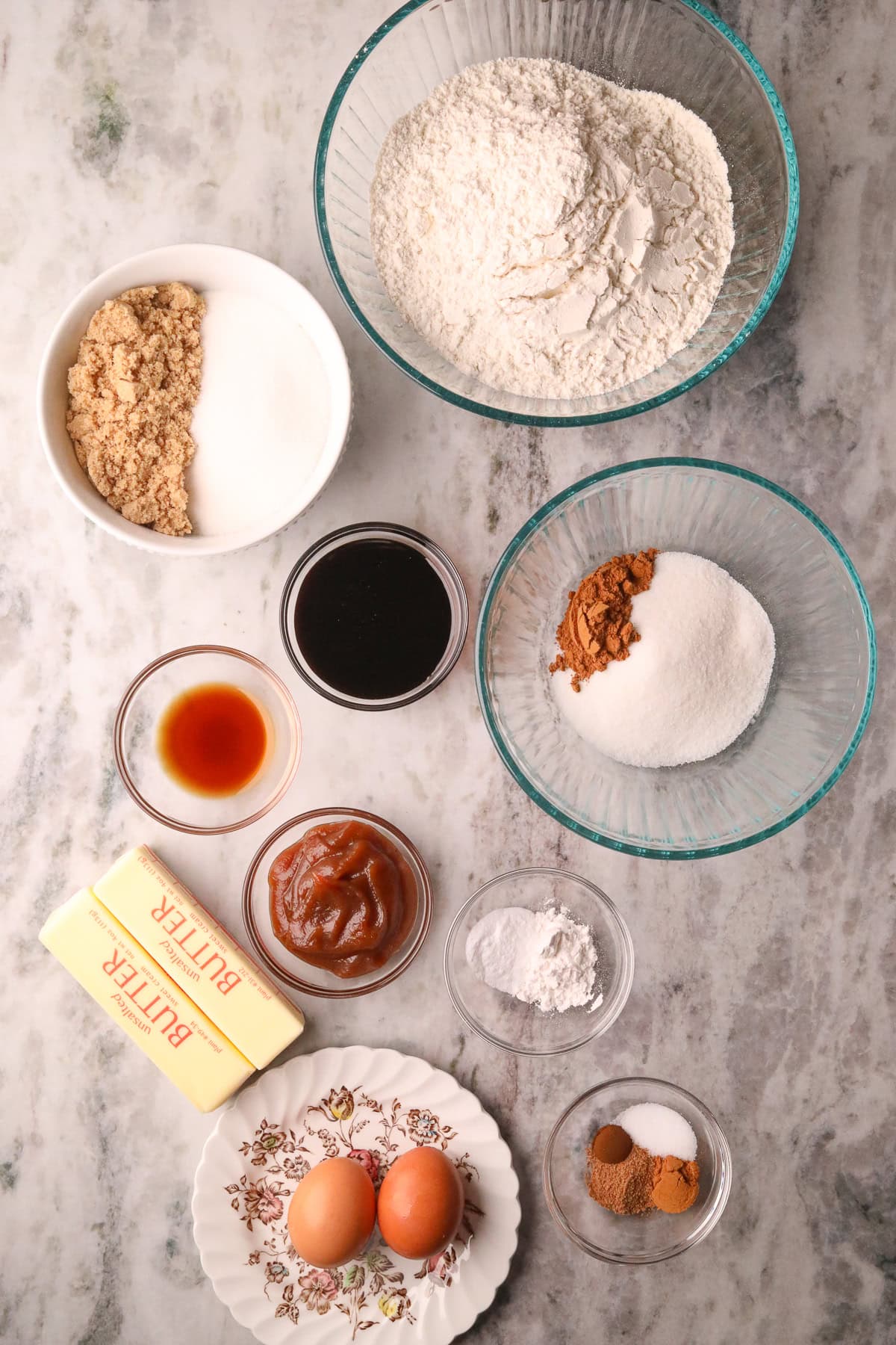 Ingredients for making apple butter molasses snickerdoodles on a table top.