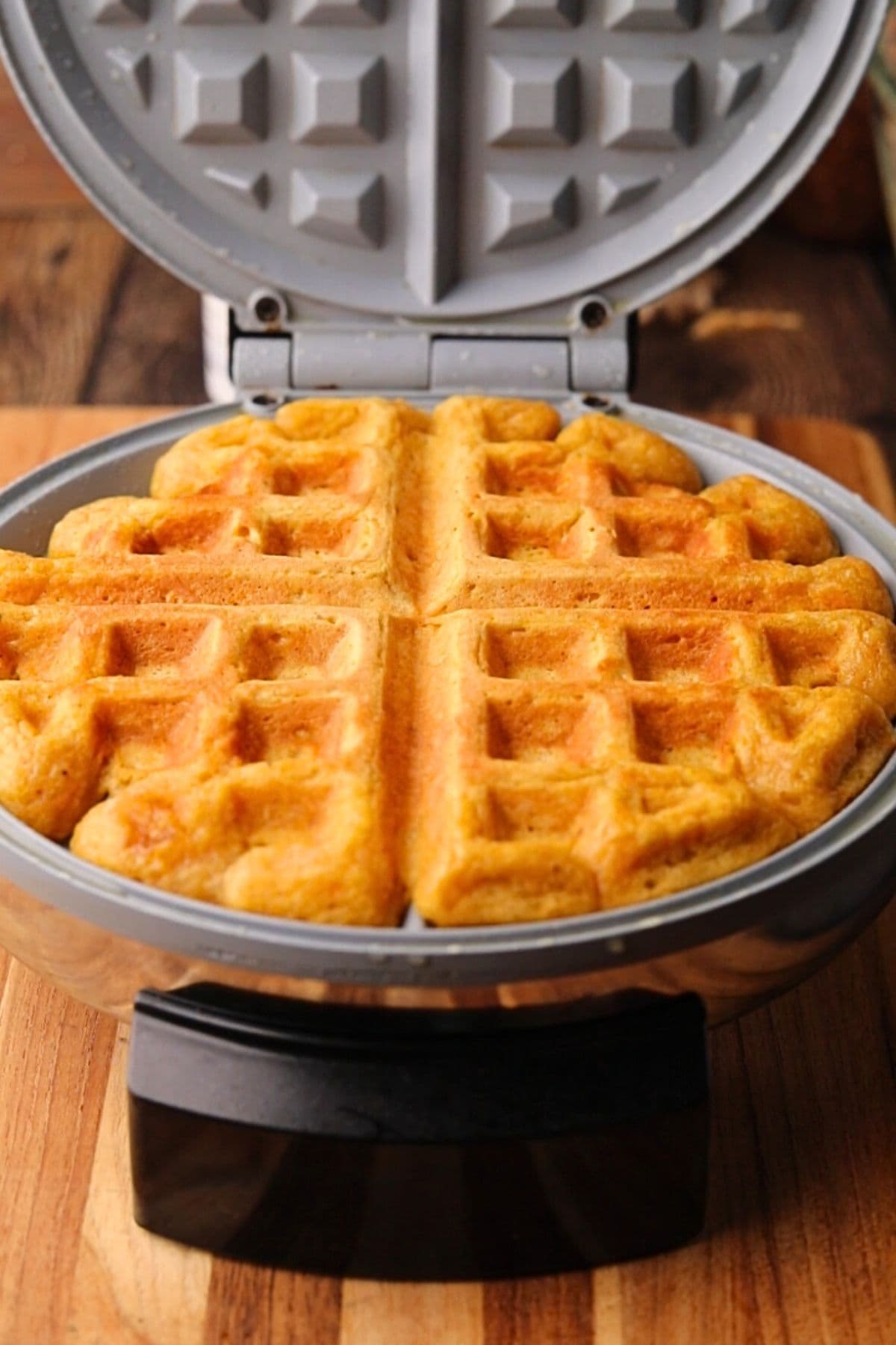 freshly cooked sweet potato, waffle on a waffle iron.