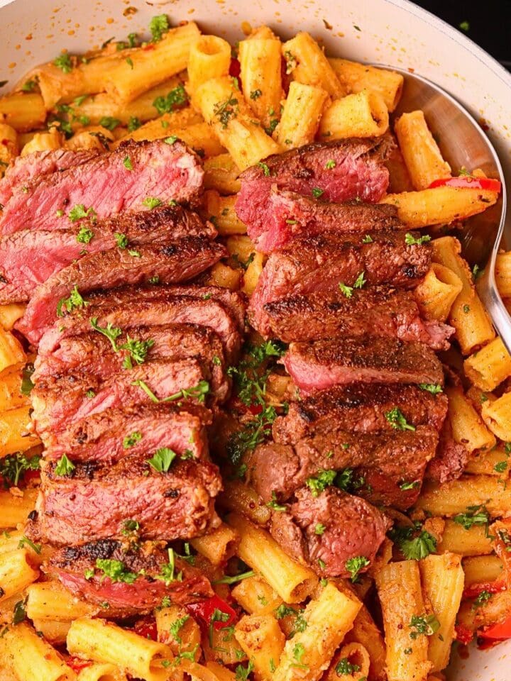 Cowboy butter steak rigatoni in a skillet.