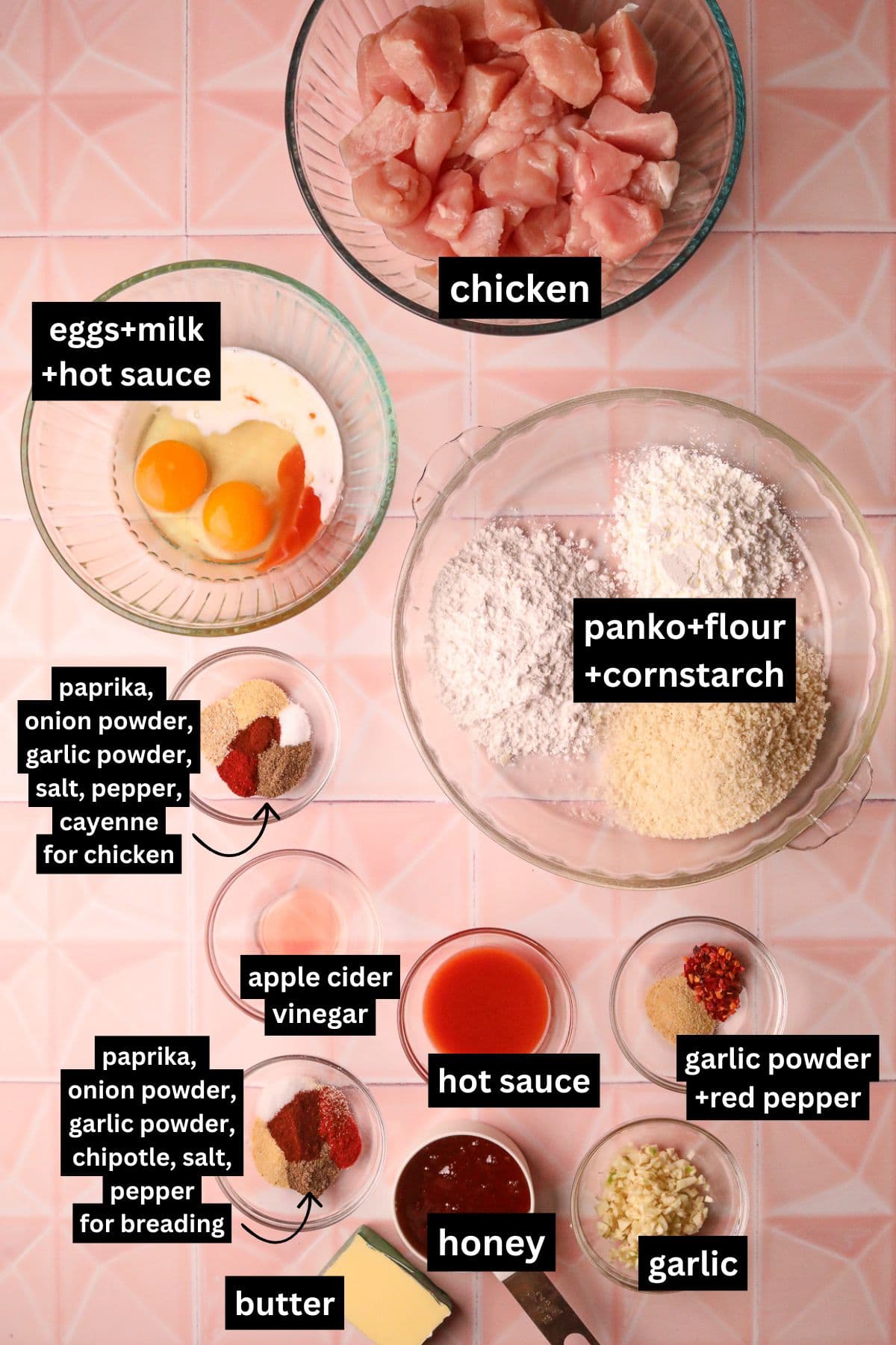 Crispy hot honey, garlic chicken bites, ingredients, arranged in bowls on a table top.