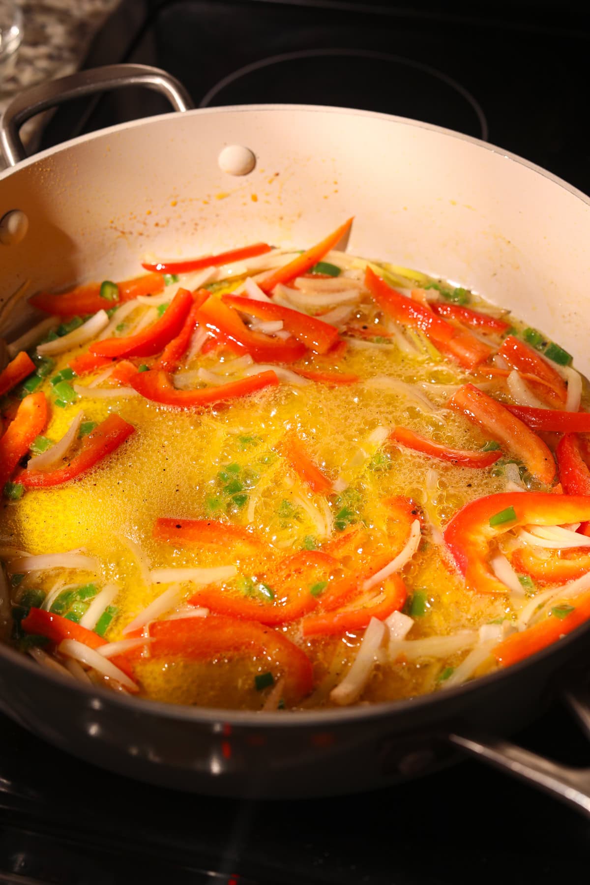 Veggies, cooking and butter for cowboy butter rigatoni.