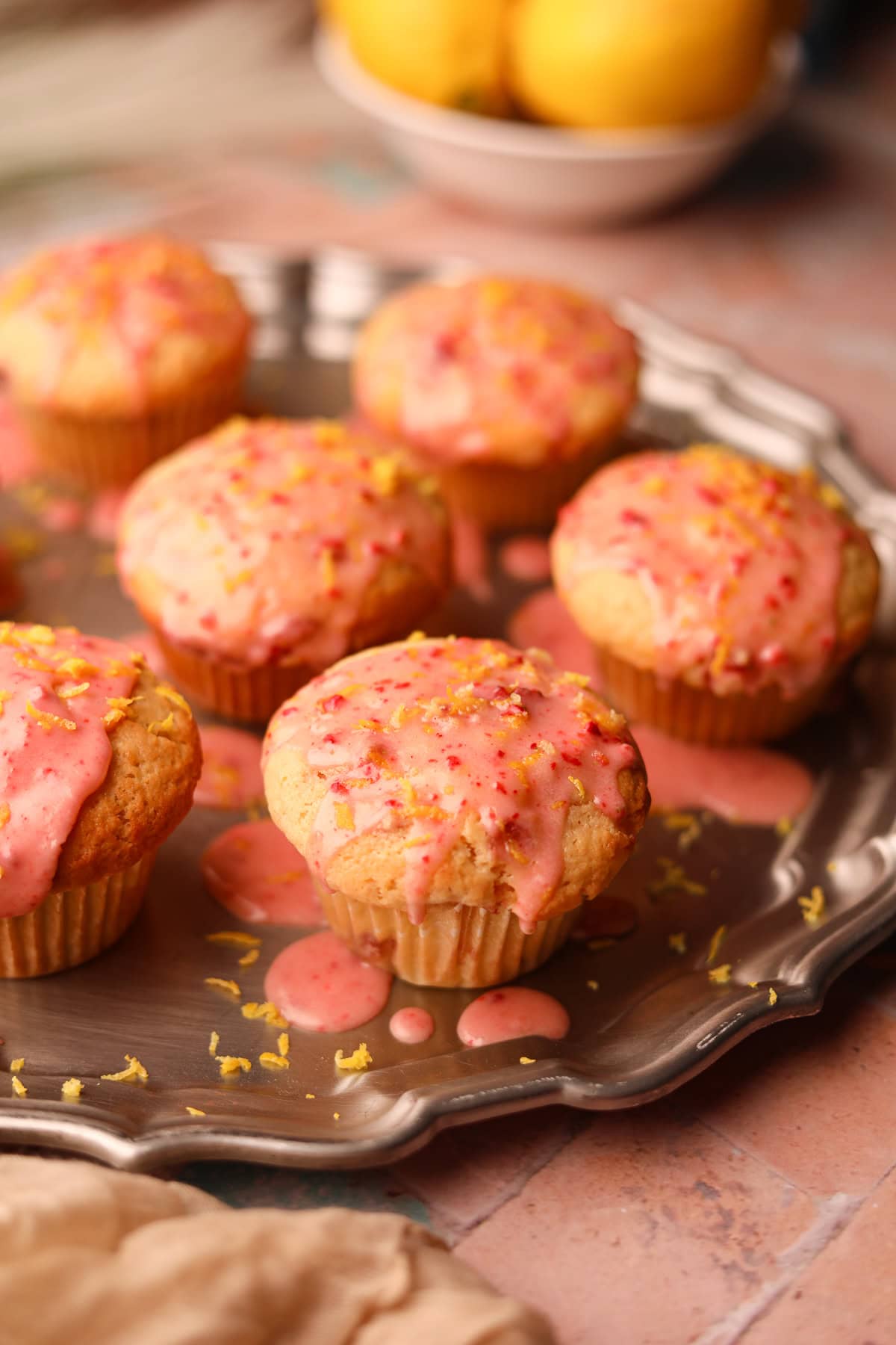 Strawberry lemonade, muffins on a silver platter. 