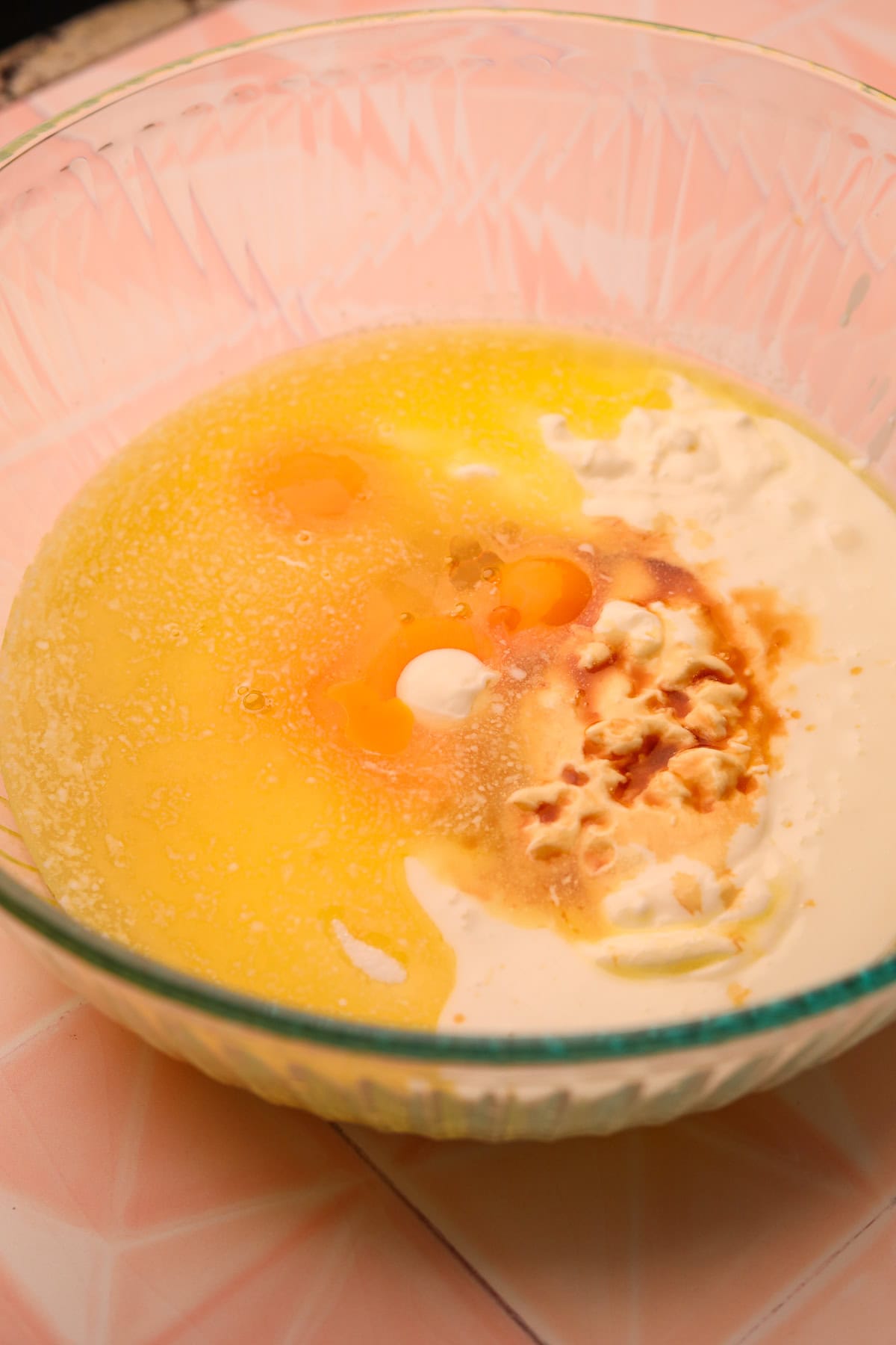 wet ingredients in a glass mixing bowl.