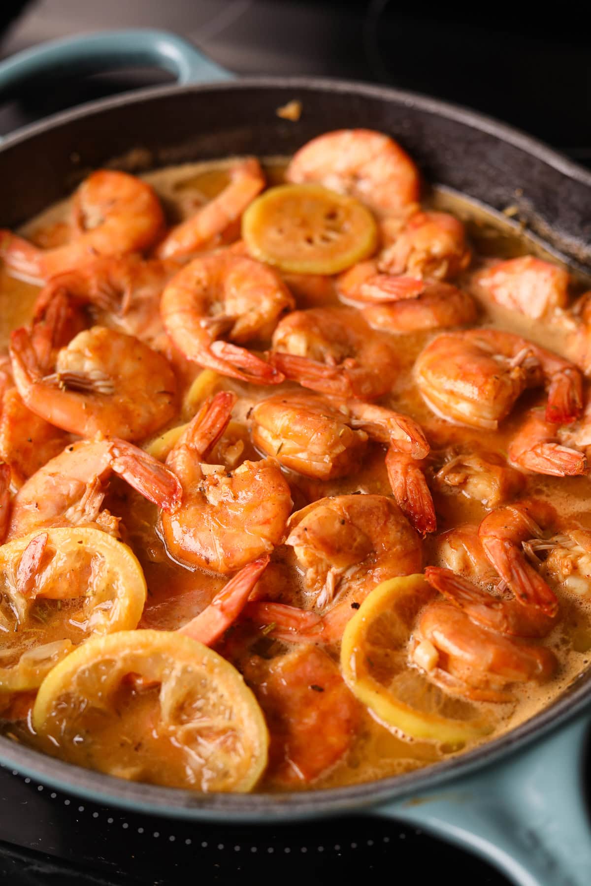 New Orleans BBQ shrimp in a skillet.