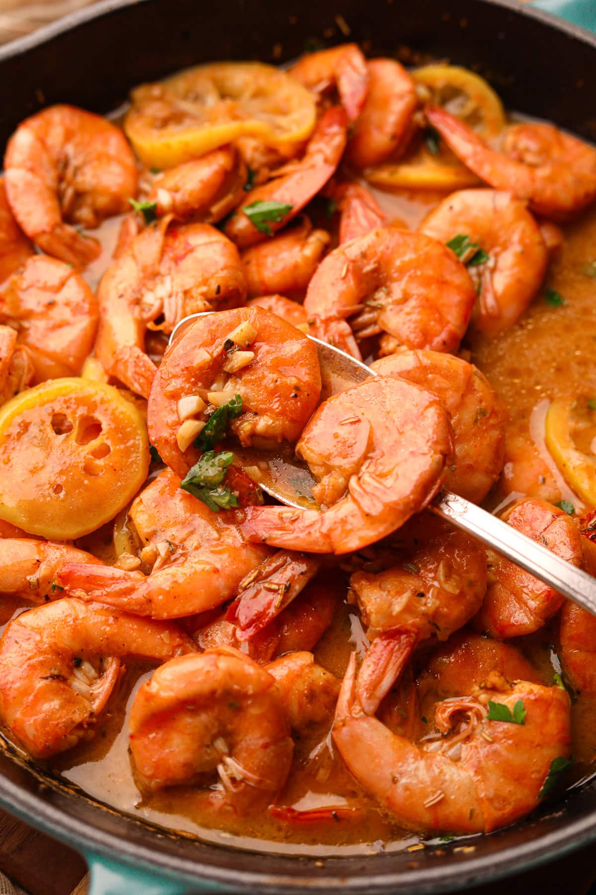 New Orleans BBQ shrimp in a skillet.