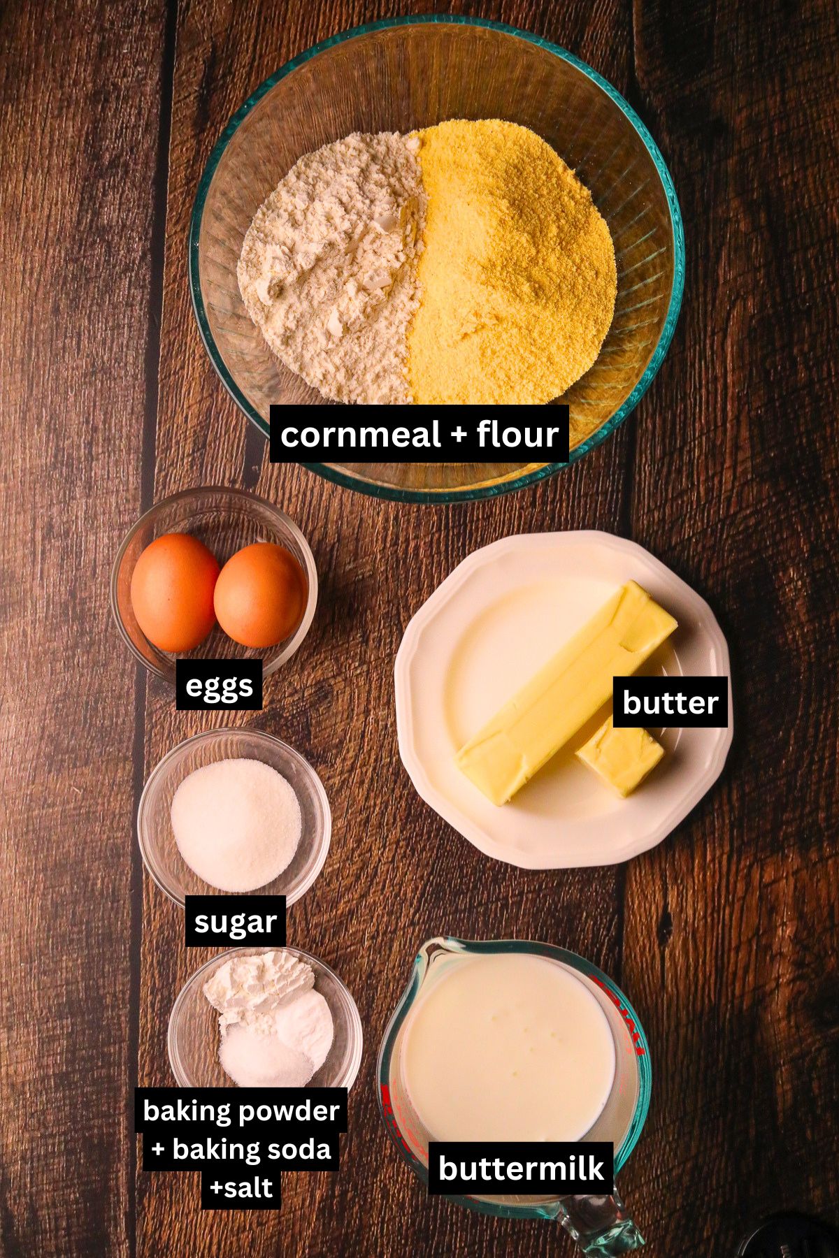 Southern cast-iron cornbread ingredients arranged in dishes on a table top.