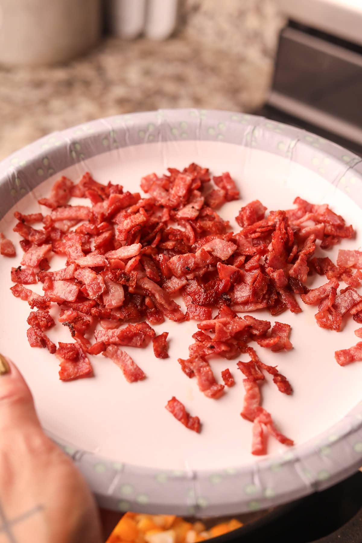 Crispy bacon for southern fried cabbage on a plate.