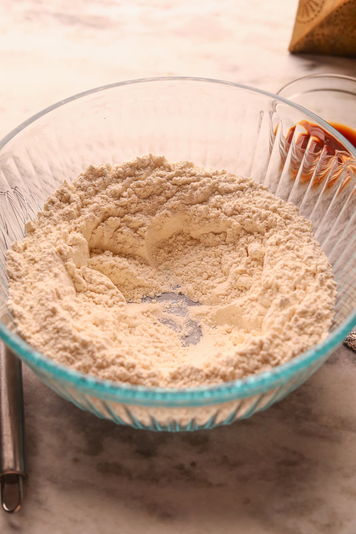 Dry ingredients for cinnamon roll. Quick bread in a mixing bowl.