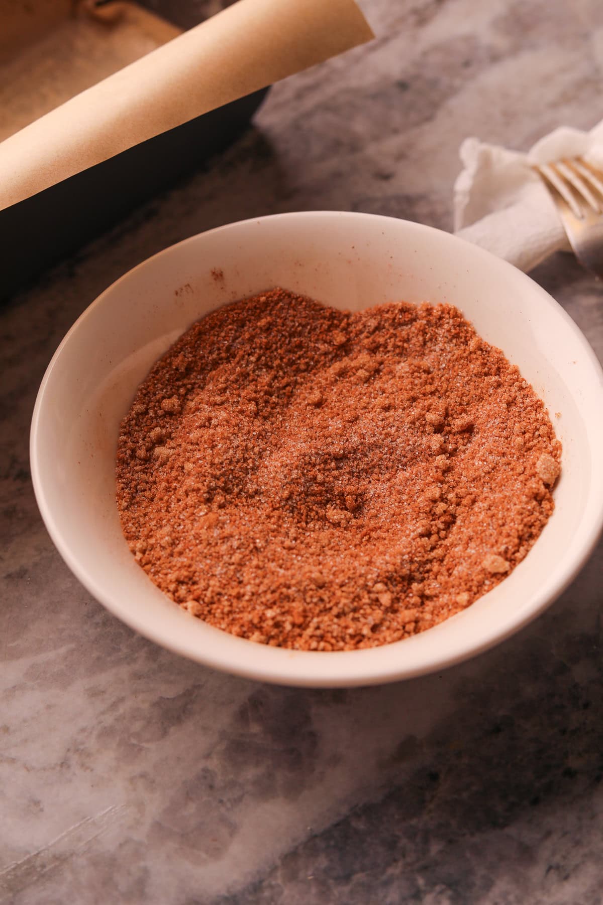 Cinnamon sugar swirl mixture in a small bowl.